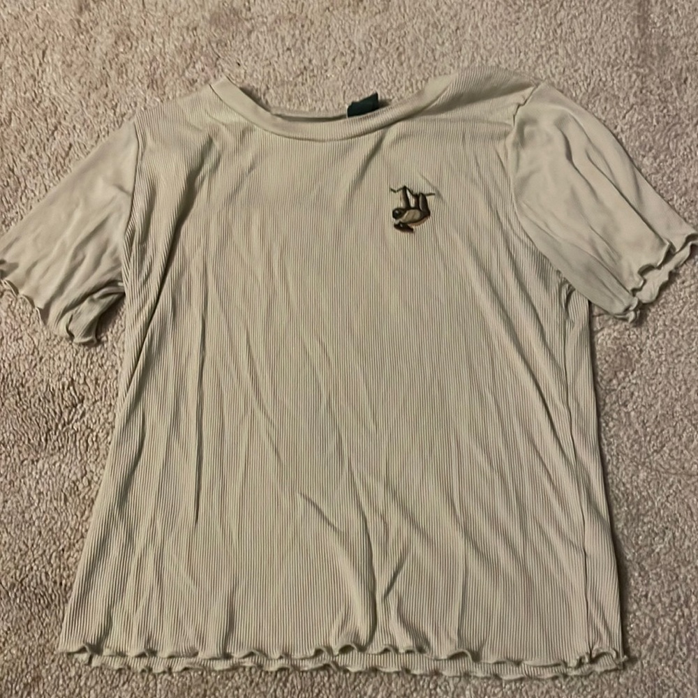 Short tan tight fitting shirt
